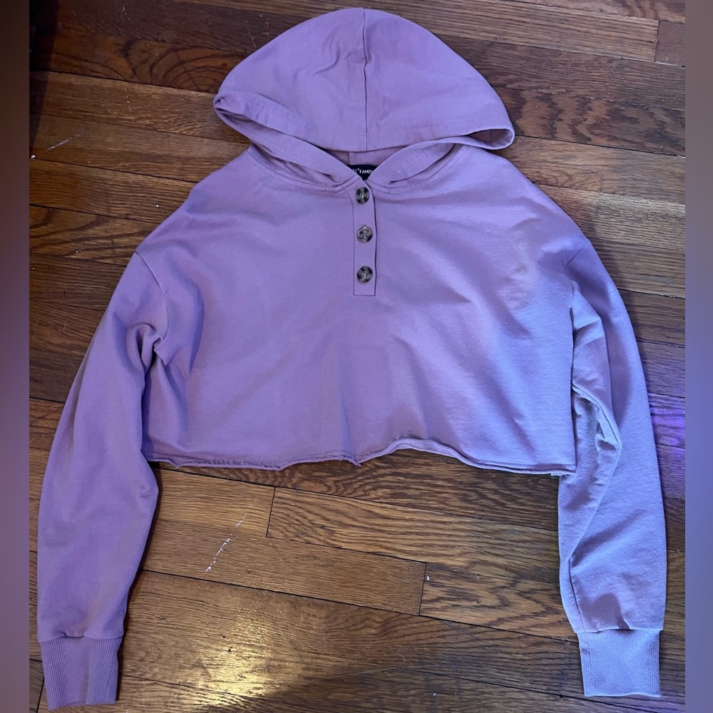 Almost Famous women’s purple cropped hoodie.